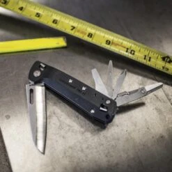 Leatherman FREE K4 Multipurpose Knife -Chefs Knives Store LT832664 Leatherman Free K4 on Workbench