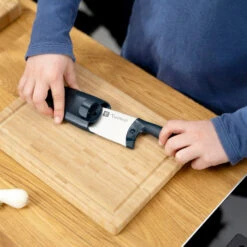 Twinny Kid's Chef's Knife By Zwilling 24 Twinny Kid's Chef's Knife By Zwilling -Chefs Knives Store ZHTwinny Putting on Sheath