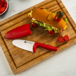 Twinny Kid's Chef's Knife By Zwilling 27 Twinny Kid's Chef's Knife By Zwilling -Chefs Knives Store ZHTwinny Red on Sandwich Board