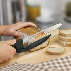 Swiss Classic 8" Serrated DUX-Knife With Adjustable Slicing Guide By Victorinox -Chefs Knives Store vf6866321 slicingbread x1000 4cd18568 8e47 4881 b791 dd180096a8e6